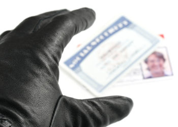 hand stealing id cards