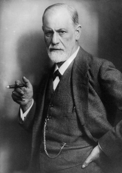 Sigmund Freud, founder of psychoanalysis, smoking cigar. (Photo credit: Wikipedia)