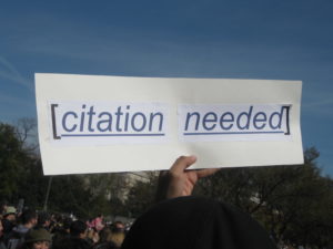 Sign reading, "citation needed"
