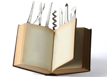 Open Book with Work Tool