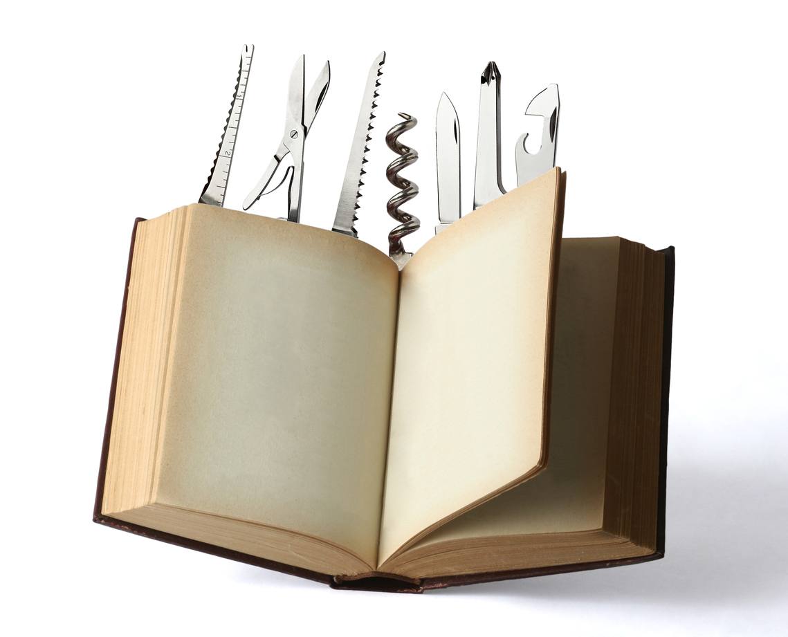 Open Book with Work Tool