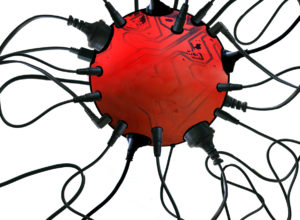 power cords plugged into a red sphere