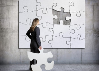 businesswoman and missing puzzle piece