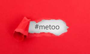 #metoo hashtag on red background