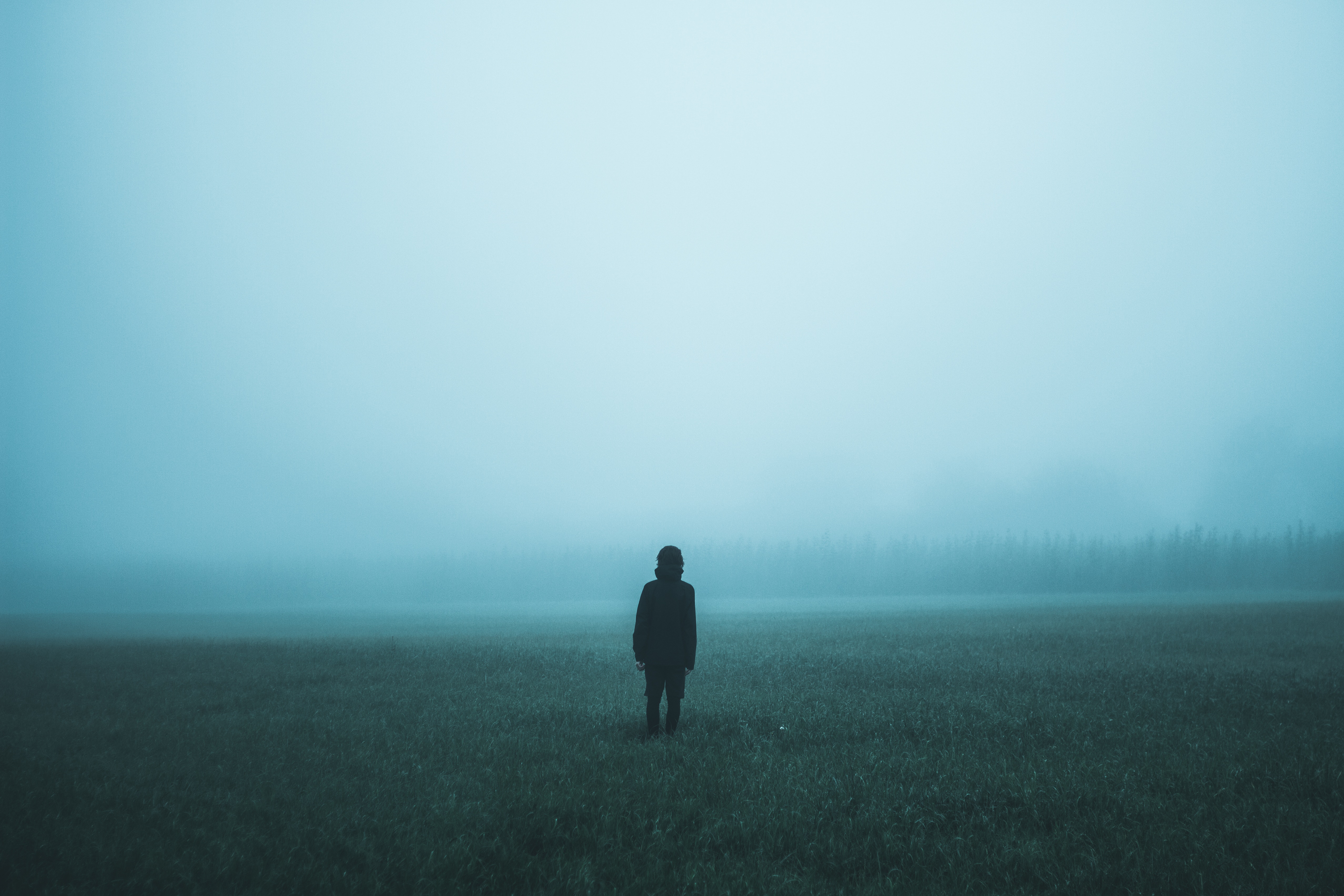 person staring into fog