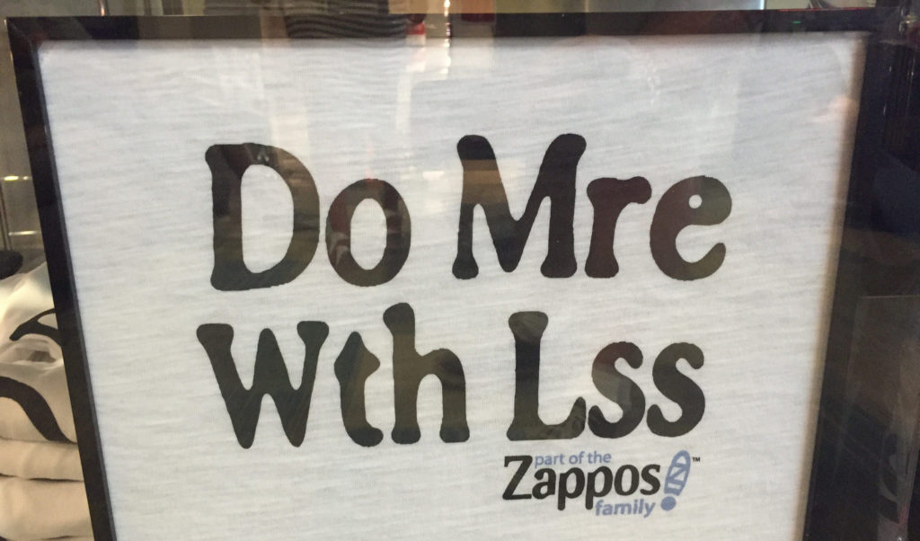 Do More with Less Sign