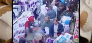video framegrab of shoppers buying toilet paper