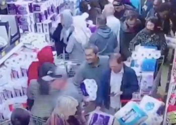 video framegrab of shoppers buying toilet paper