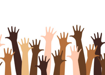 Diverse raised hands isolated on a white background.