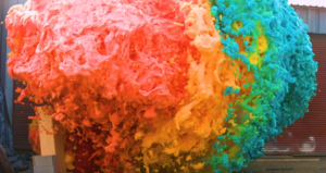 screengrab of rainbow colored chemical reaction