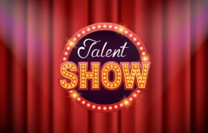 "Talent Show" inscription bright on red curtain.