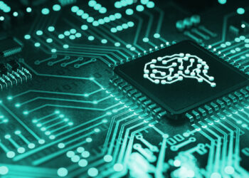 chip in a computer with a human brain drawn on it