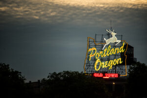 Night glowing stag sign old town Portland Oregon