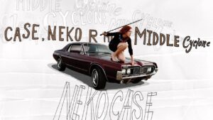 Neko Case Middle Cyclone album cover, Neko on the hood of a Mercury Cougar brandishing a sword