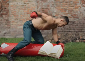 boxer punching a book