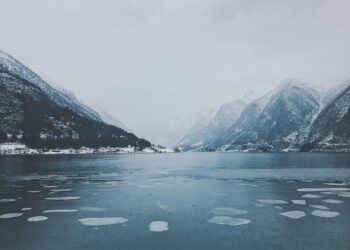 view of snowy mountains from the icy waters