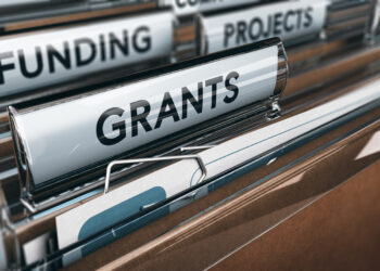 File cabinet drawer with files labeled "Funding" "Projects", and "Grants"