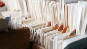 Papers in file folders, representing scholarly articles collected by a researcher or library