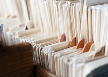 Papers in file folders, representing scholarly articles collected by a researcher or library