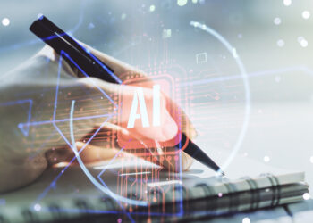 hand writing in notebook with pen with an overlay of AI related graphics