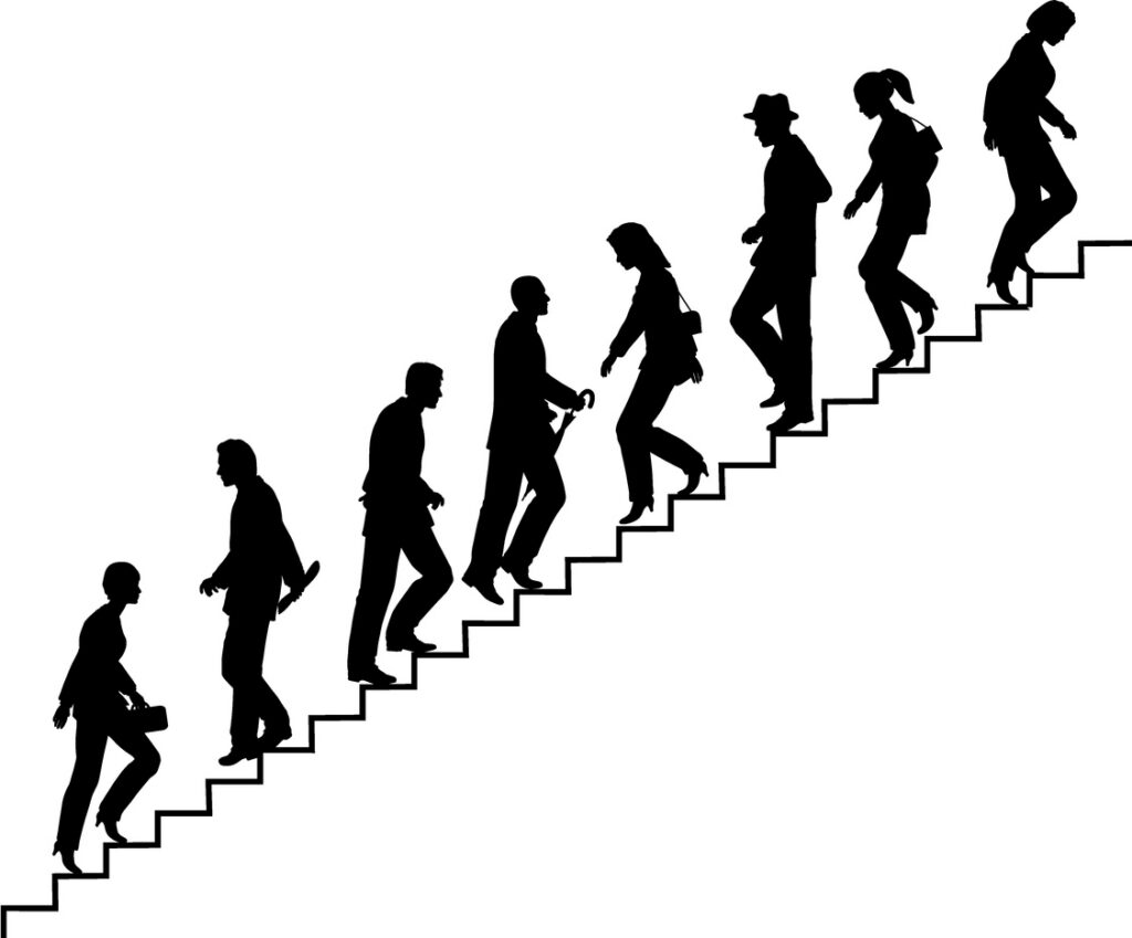 Editable vector silhouette of people on stairs with all elements as separate objects. hi-res jpeg file included.