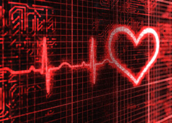 Closeup of a digital pulse and heart background