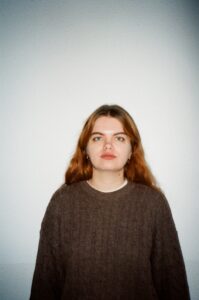 Professional headshot for Lena Ryzhova, a recent graduate of the MA in Book and Digital Media Studies at Leiden University.