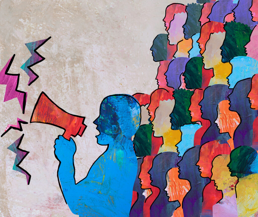Person speaking holding megaphone with group of people protesting behind them. Decorative graphic representing freedom of speech and democratic communications.