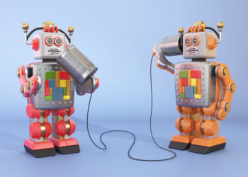 Two colorful toy robots are using tin cans connected by string to communicate