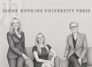 Wendy Queen, Lauren Kane, and Barbara Kline Pope in the lobby of the Johns Hopkins University Press building in Baltimore.