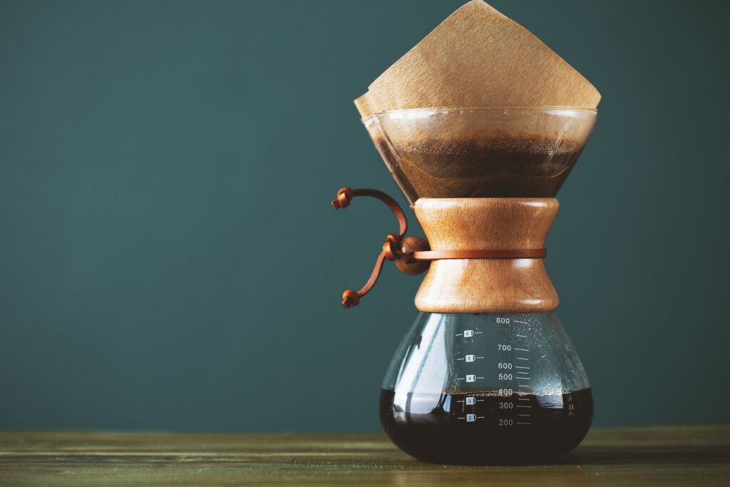 Pour over coffee being filtered as it enters a carafe