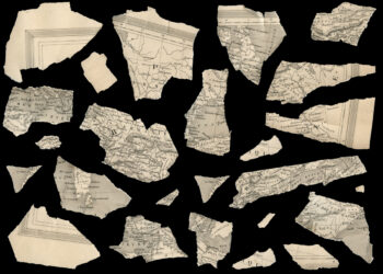 Decorative image: pieces of an antique fragmented french map against black