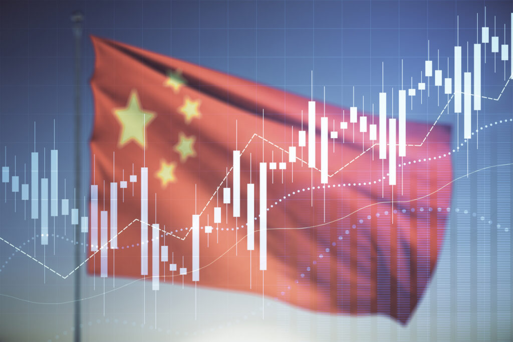Chinese flag against a blue sky overlaid with a chart showing rising figures