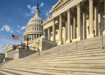 Detail view of the US Capitol east facade in the early morning sun.
