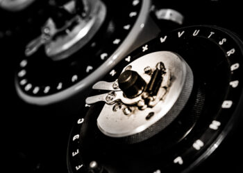 Enigma Machine gears removed from their case. There are two gears with letters on the outside in black with white letters The dials from a World War 2 'Bombe' checking machine used to crack the German 'Enigma' codes.