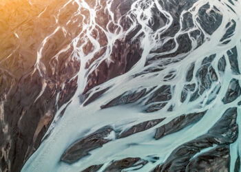Decorative image of aerial view of braided river. Scenic view of Markarfljot in Iceland. Image is representing beautiful nature. Glacier river from Eyjafjallajokull.