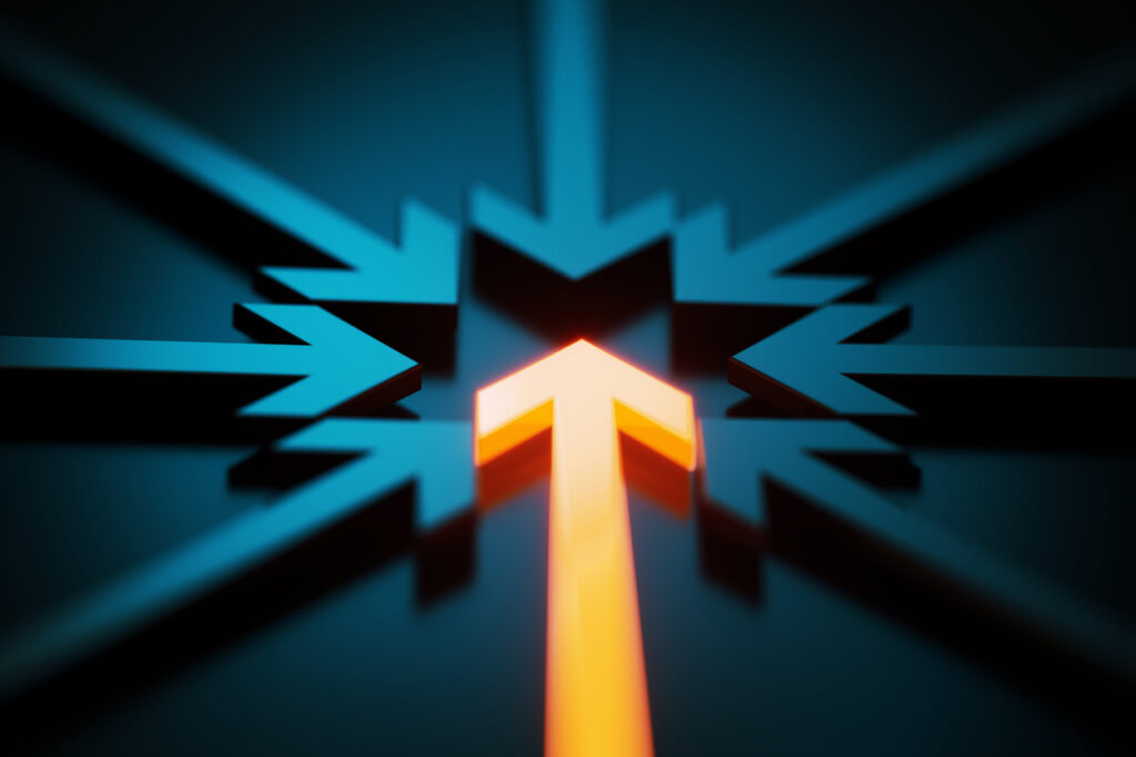 Arrow symbols merging on dark blue background. One of the arrows is orange in color