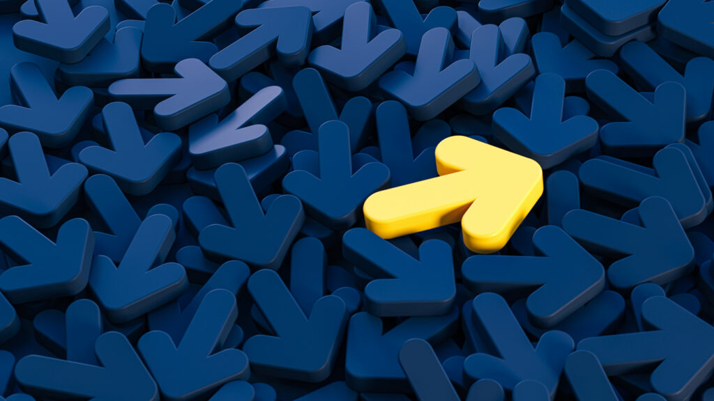 Decorative image: Description: A collection of 3D black arrow icons is stacked together, representing a mix of thoughts and directions. At the top of the pile is a distinct yellow arrow, symbolizing clarity and leadership among the confusion of various directions. This minimalistic composition reflects the challenge of finding one's path amidst differing ideas, illustrating the concept of directional focus and decision-making. The contrast of the yellow arrow against the black arrows emphasizes the idea of standing out and leading in a new direction. 3D rendering enhances the visual depth and impact of the concept.