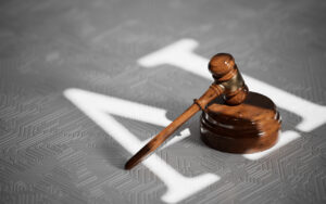Image of a gavel with the letters AI projected on the surface beneath it